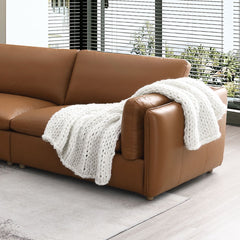 The Brighton sectional sofa exudes contemporary elegance and comfort. Covered in brown top grain leather, this spacious sectional is perfect for family gatherings or cozy evenings at home. Its sleek design and plush cushions offer both style and relaxatio