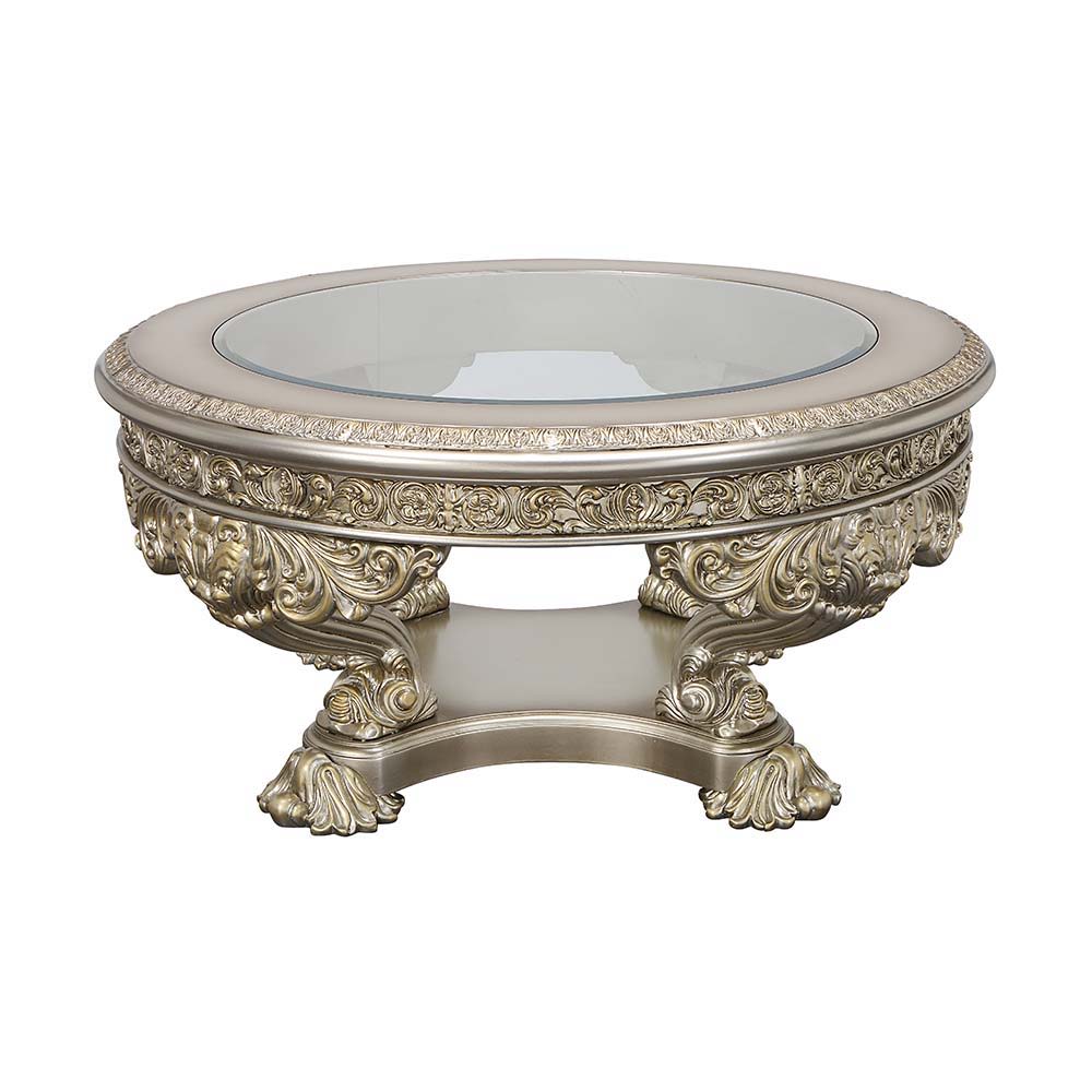 Lavish and grand, the Danae coffee table offers the right amount of wow factor that your living space needs to create a classy home. The antique white and gold finish enhances the ornate carvings on the base and apron of the table. Display books and decor