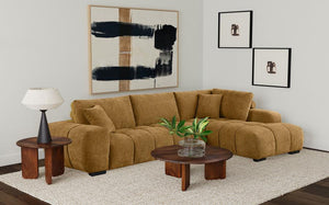 Finding inspiration in mid-century Italian furniture design, this L-shaped sectional sofa creates a rich, inviting ambiance in your living room. It boasts soft upholstery in a warm hue, creating the perfect gathering place for families and friends. Its co
