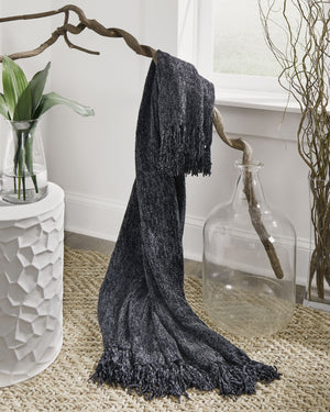  this black throw blanket also makes a stylish statement. Whether draped over the arm of a sofa or folded at the foot of a bed