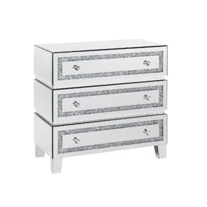 The Noor Cabinet will add a contemporary touch to any room in your home. With its clean lines and faux diamond inlay, this brilliant cabinet showcases a distinctive style for an intriguing look. The cabinet features two doors and two storage drawers with 