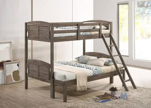 A casual country vibe carries the space with this rustic bunk bed, perfect for compact bedrooms and shared sibling spaces. A weathered brown finish lends a neutral hue to transform a space into a serene, restful retreat. Along the top bunk are safety guar