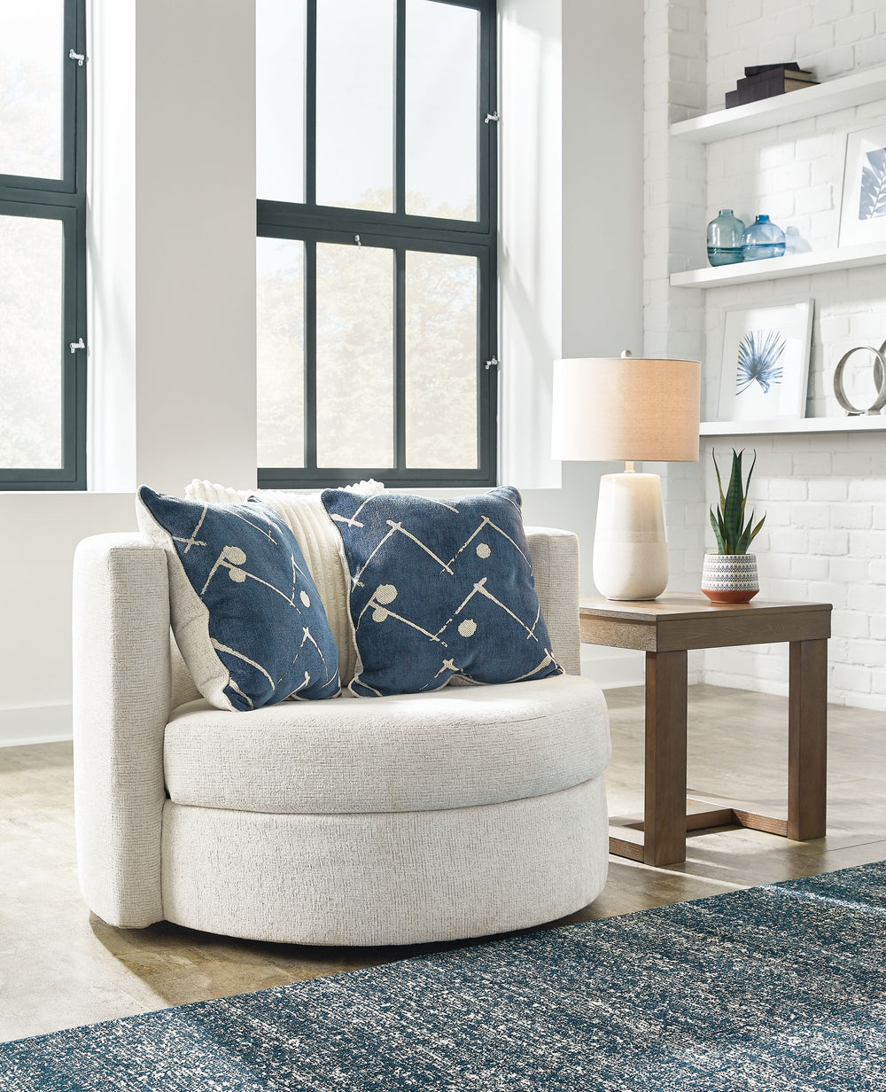 Freshen up your living room style with this accent chair. Its seamless swivel design features a reversible seat cushion you can flip over to revive your seating space or remove to clean hard-to-reach areas. And a light neutral hue decorates the simple, co