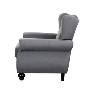  nailhead trim on the rolled armrests
