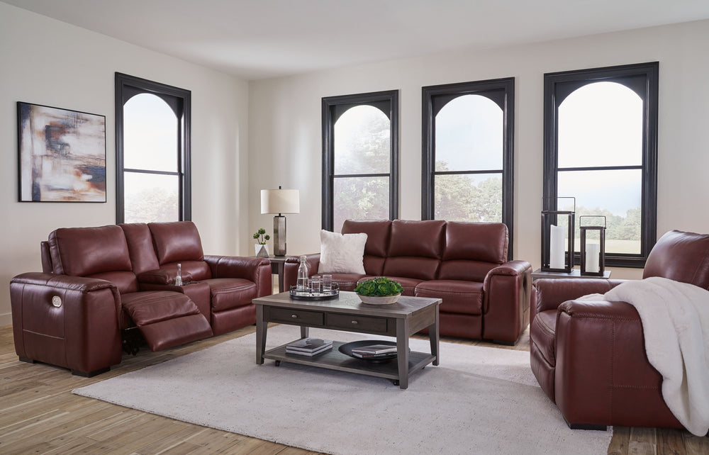 Impressive in scale while keeping an air of refinement, this power reclining group stuns with soft, supple leather match upholstery in garnet. Sink into real leather in the seating area and inside back while catering to your comfort with one-touch power r
