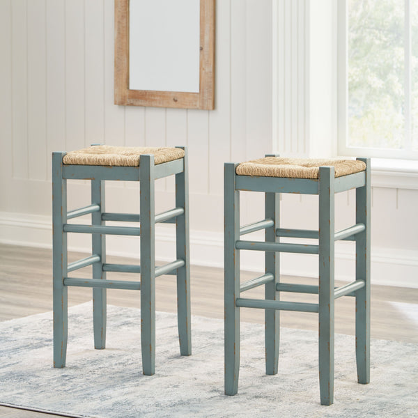  this charming stool completes your dining space with ease. The woven seagrass seat and wood stretchers create an effortl