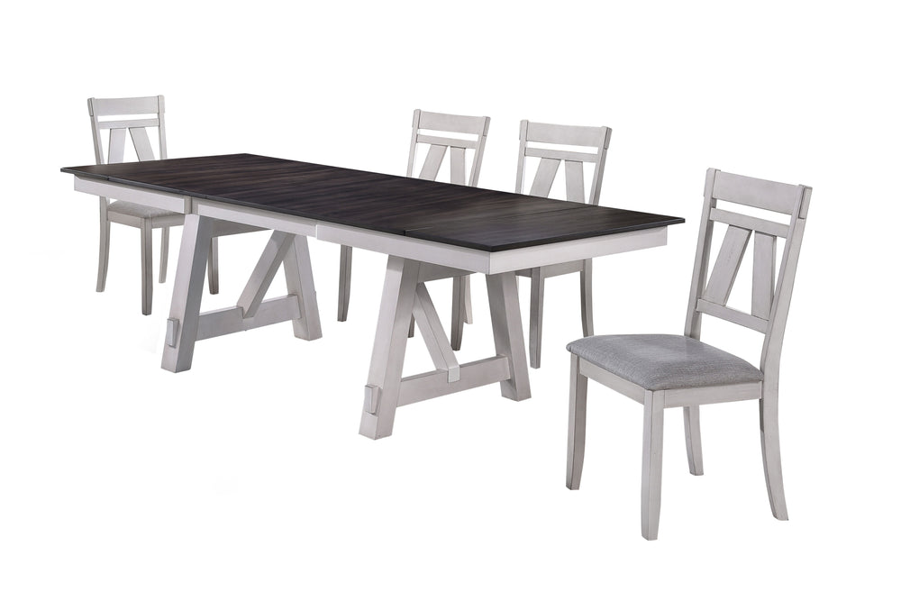 The Maisie 5 Piece Wood Dining Set combines quality construction with modern rustic style, making it a perfect addition to any dining space. This set includes a two-tone dining table with self-storing leaves and four dining chairs. Crafted from solid rubb