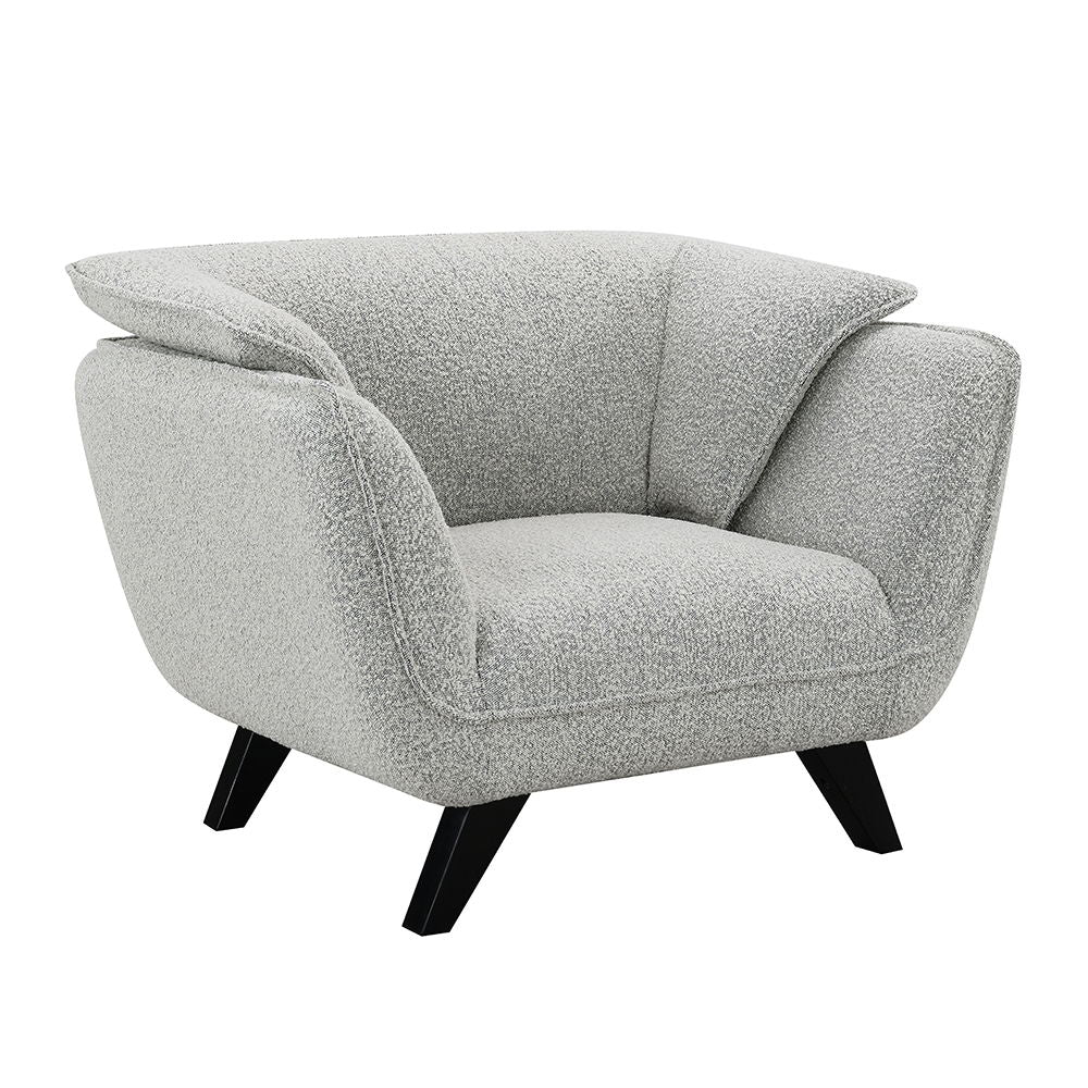 Unwind in the sophisticated charm of the Manon sofa, draped in light gray fabric. Accompanied by plush pillows, it offers a perfect blend of comfort and style. This sofa invites cozy conversations and serene relaxation, making it an ideal addition to any 