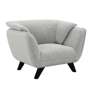 draped in light gray fabric. Accompanied by plush pillows