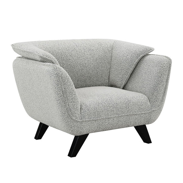  draped in light gray fabric. Accompanied by plush pillows