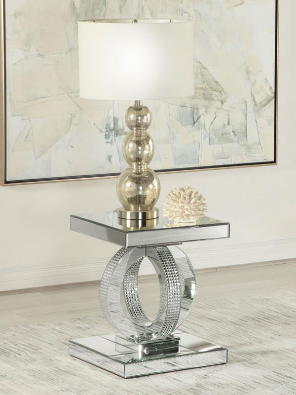  while every other surface is wrapped in sleek mirrored panels. Softly beveled edges ad