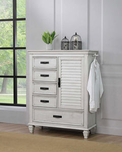 Exquisite detailing and versatile storage options make this wooden door chest a fashionable and functional choice. Inspired by island resort style, this chest pulls out all the stops to provide convenience storage space. A generous array of drawers and an