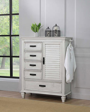 Exquisite detailing and versatile storage options make this wooden door chest a fashionable and functional choice. Inspired by island resort style, this chest pulls out all the stops to provide convenience storage space. A generous array of drawers and an