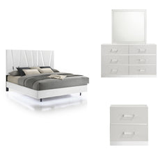 The Europa 4 Piece Bedroom Set in white is the epitome of modern elegance and practical design. This set includes a panel bed along with a dresser, mirror, and nightstand. The sleek, sophisticated look is achieved through a majestic headboard, glossy whit