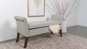  it boasts flared arms and meticulous button-tufting