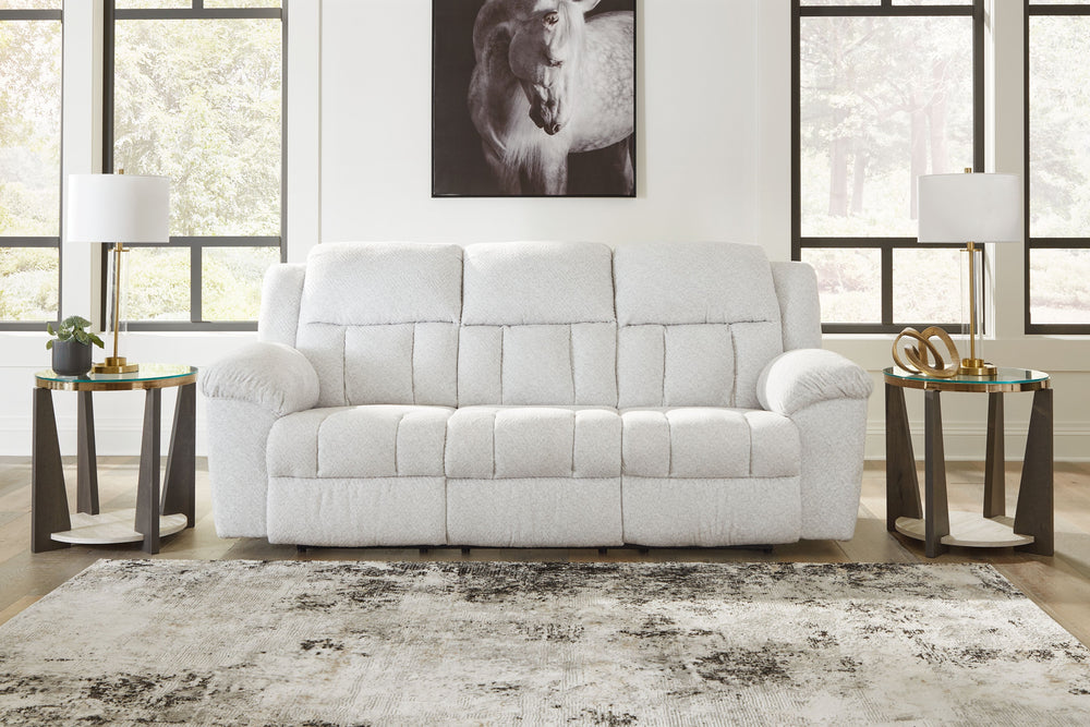 With its large-scale design, this extra-spacious reclining sofa is a masterclass in accessible style. Plush, ultra-soft upholstery keeps everyone cozy as you lounge with family or guests. In a neutral hue, it seamlessly suits different aesthetics as your 
