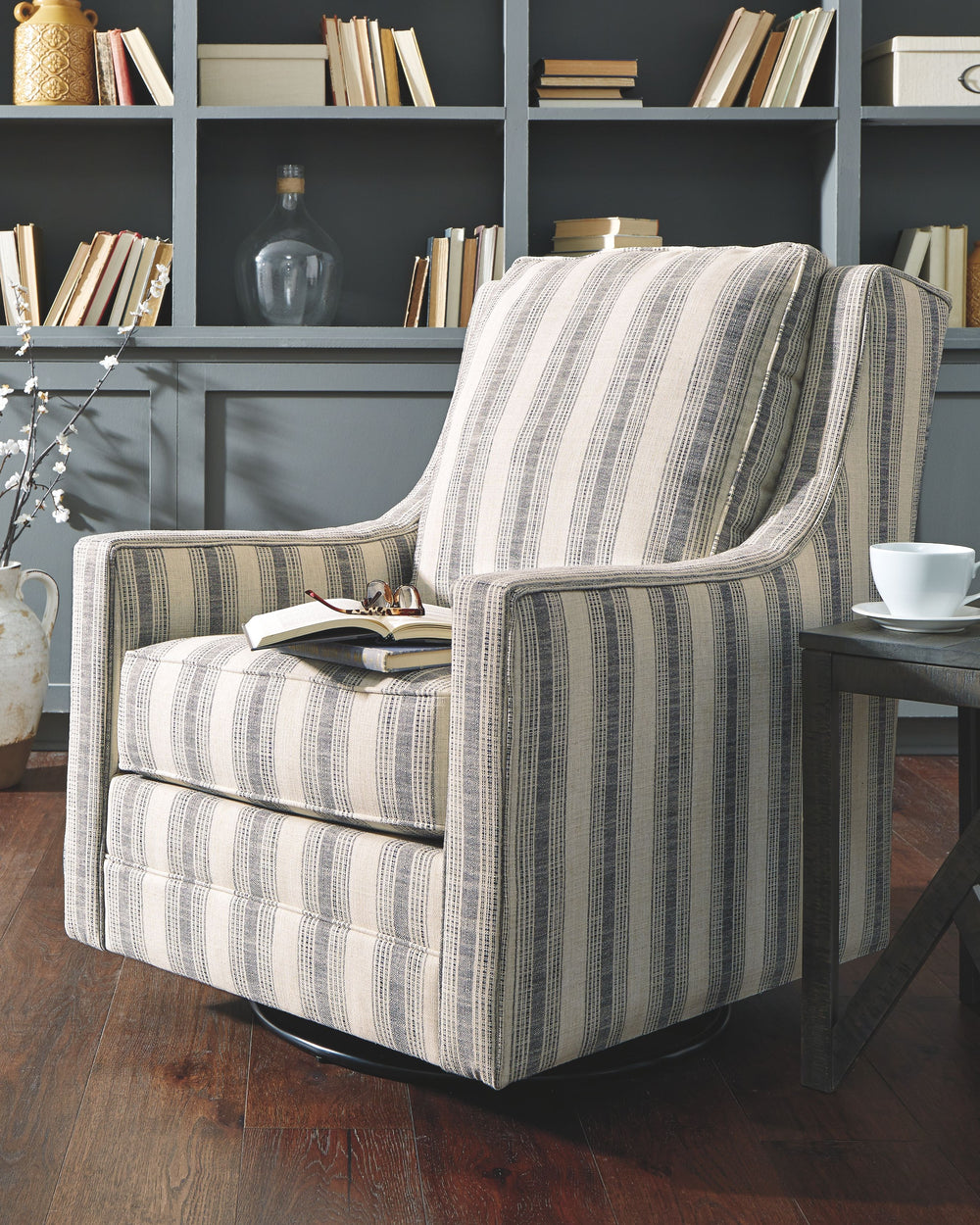 Crisp and coolâ€”but not without its own curvesâ€”this accent chair lends a quiet confidence to your room. The subtle geometric pattern and slope arm design keep this grownup accent chair feeling youthful.<br><br><b>Additional Dimensions</b><br><ul><li>Ar