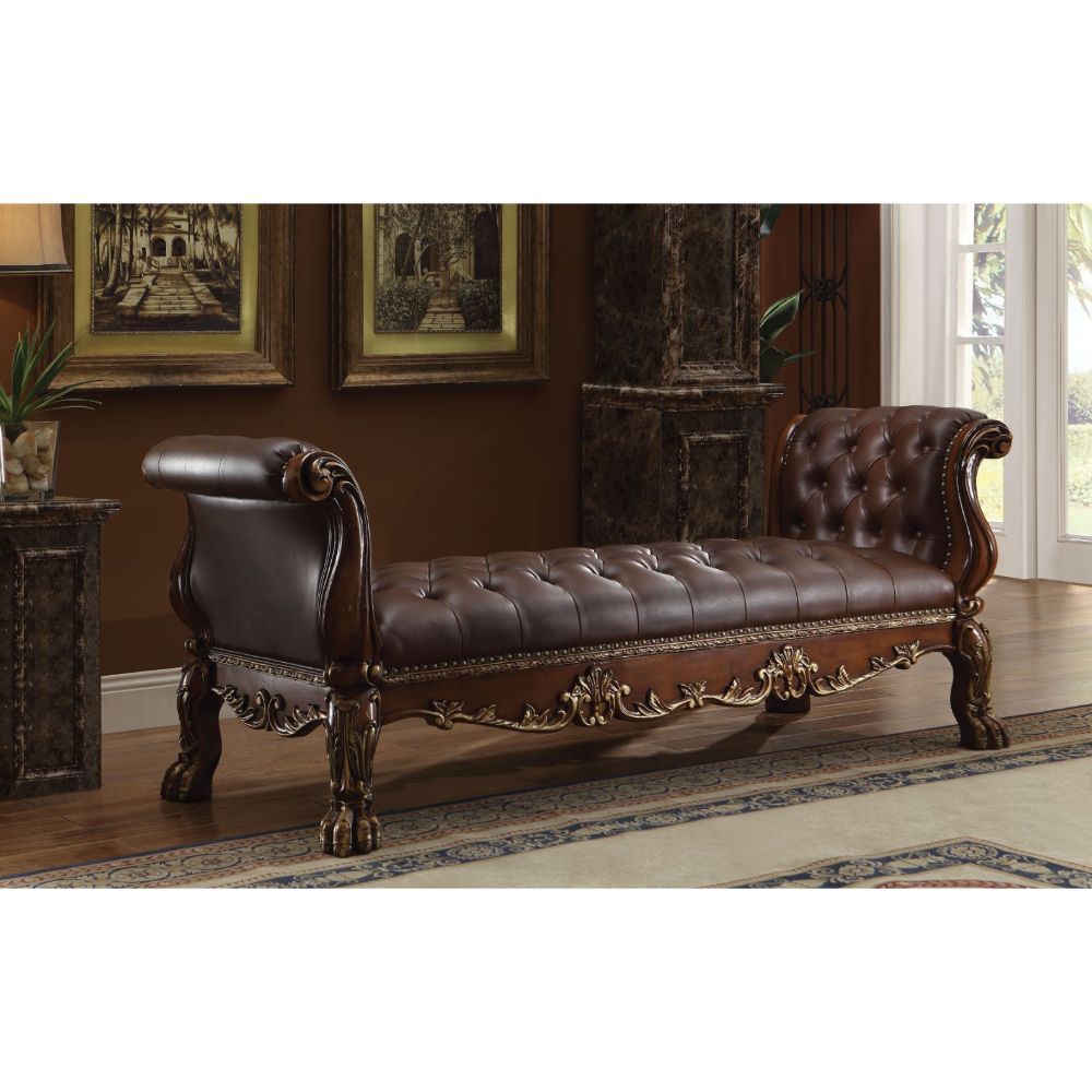 The Dresden Cherry Bench brings elegant and traditional design into your living room. A hand-crafted piece inspired from the luxurious designs of the past, this stunning piece comes in a cherry oak finish and features button-tufted seat and arms with elab