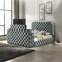 Cozy up in bed with the Kana Gray velvet bed. This bed features all the bells and whistles imaginable that make it impossible to ever leave. The built-in footboard fireplace (without heat) creates a relaxing ambiance. The footboard also houses a hidden TV
