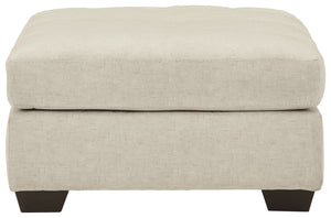  this oversized accent ottoman lures with comfortably soft box cushions and dramatic jumbo stitching for fashion-forward fl