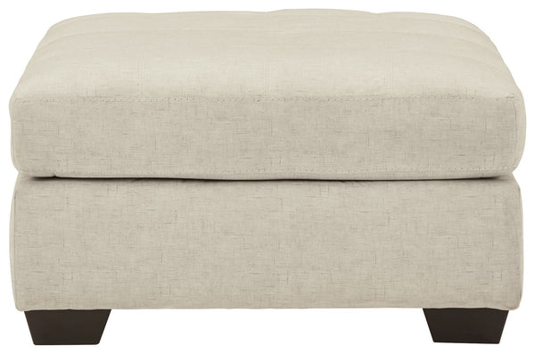  this oversized accent ottoman lures with comfortably soft box cushions and dramatic jumbo stitching for fashion-forward fl