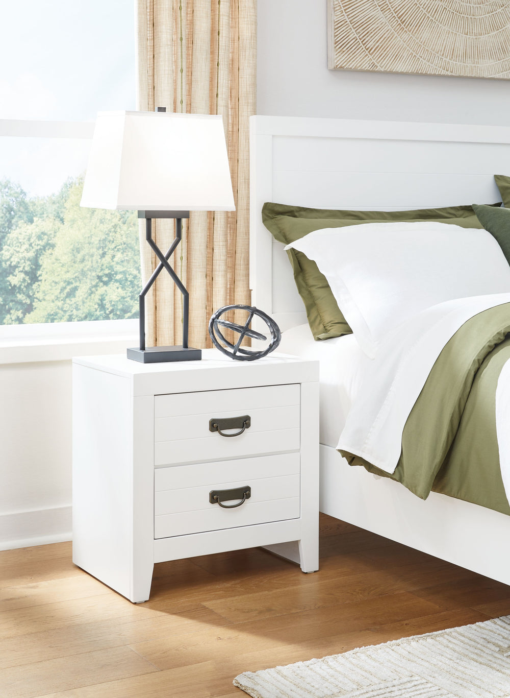 Are you a lover of casual contemporary style? Then this nightstand is perfect for you. The clean, white finish conveys an easy-breezy sensibility, while spacious drawers offer plenty of storage for bedtime essentials. Durable, sleek and stylish, it graces