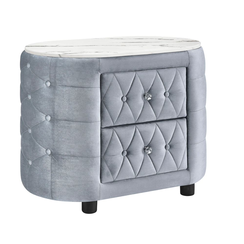 Add a touch of opulence to your space with this exquisitely designed bedside piece, blending contemporary elegance with timeless sophistication. The sleek silhouette is wrapped in a luxurious, tufted finish, complete with shimmering accents that catch the