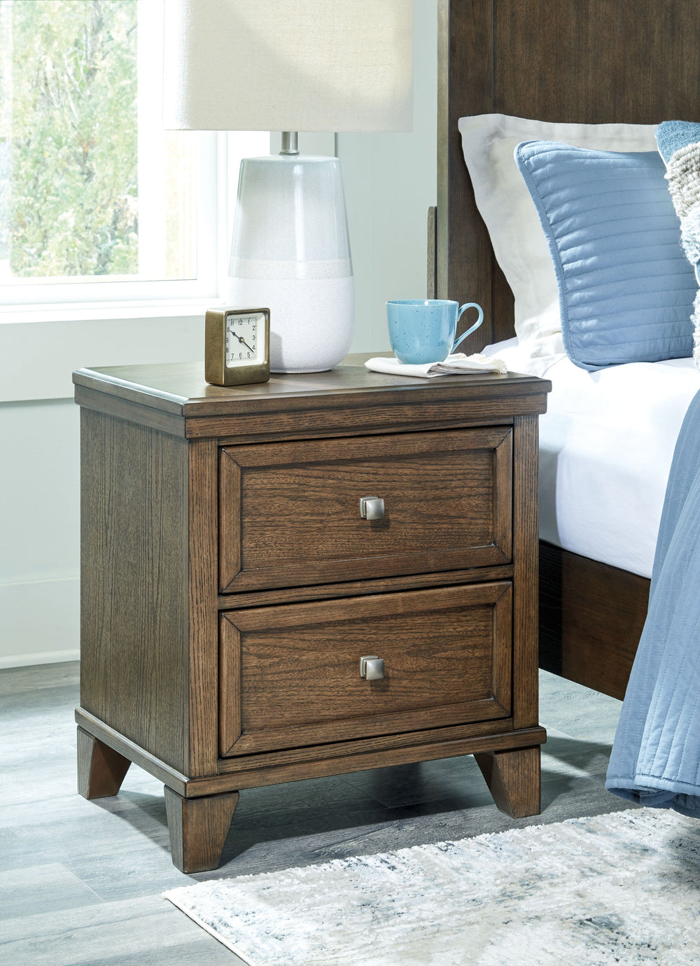 This nightstand is well-suited to everyday living with its expertly balanced approach to style and function. Take the stress out of decoratingâ€”a classic medium brown finish easily pairs with existing furniture pieces. And its timeless design stays in st