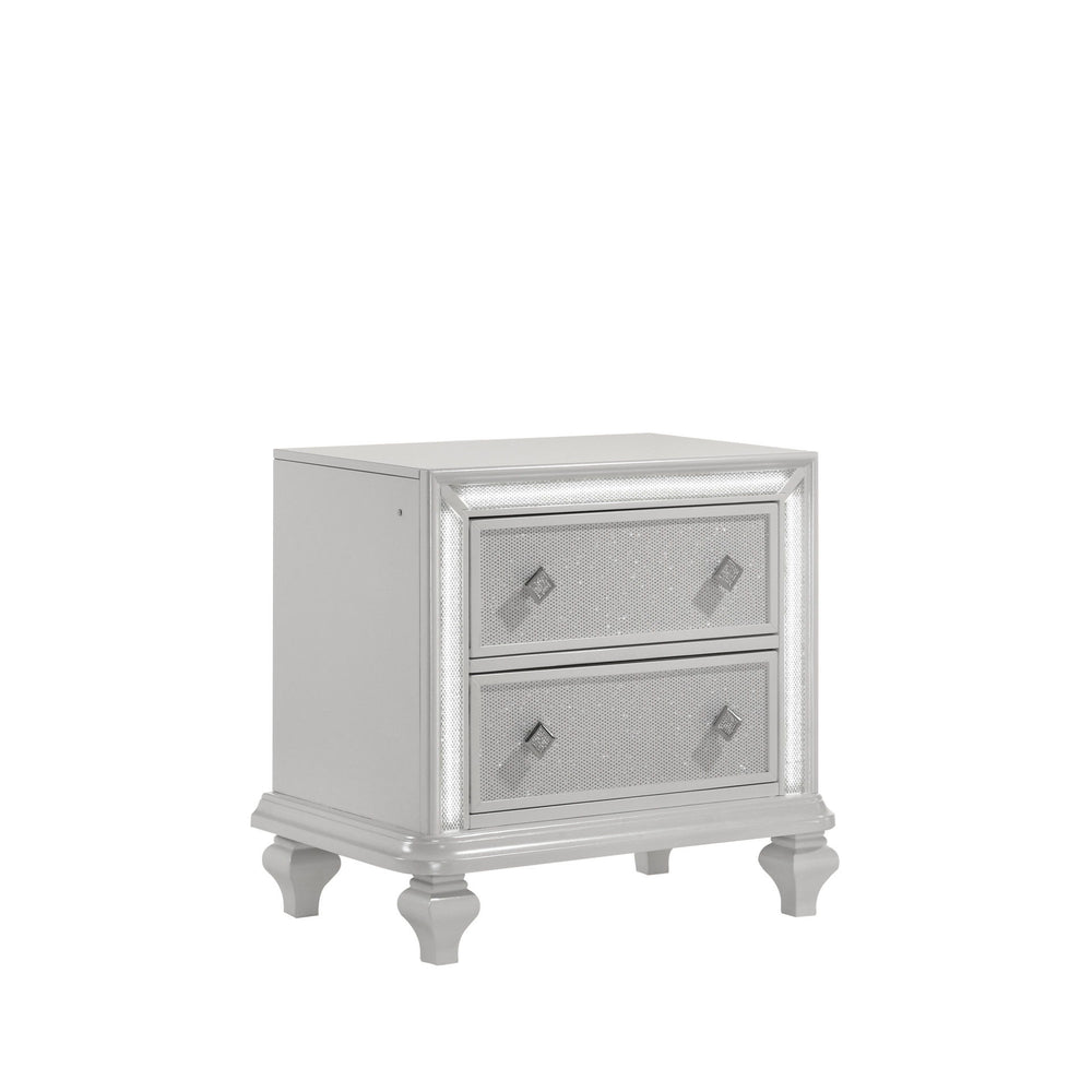 Introducing the Stardust Nightstand, a luxurious addition to your bedroom ensemble. Crafted with meticulous attention to detail, this nightstand boasts enduring strength and durability with its manufactured wood construction, complete with an eco-friendly
