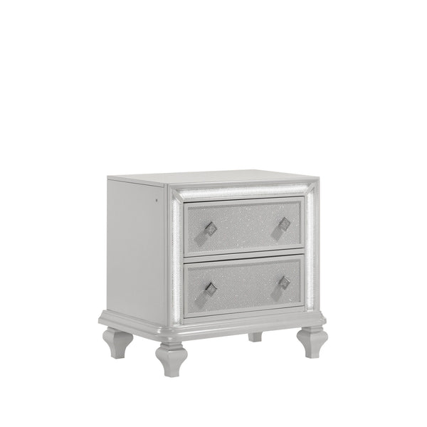 Introducing the Stardust Nightstand, a luxurious addition to your bedroom ensemble. Crafted with meticulous attention to detail, this nightstand boasts enduring strength and durability with its manufactured wood construction, complete with an eco-friendly