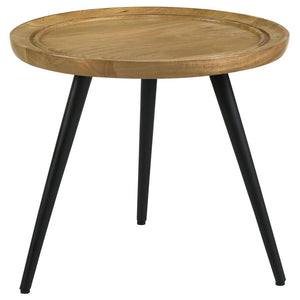 Infuse bohemian charm and mid-century style into your living space with this versatile end table. Crafted from solid mango wood, the round tabletop showcases natural wood grain patterns and a softly curved edge with carved detailing for added elegance. It