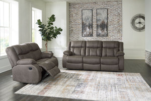 This sofa and loveseat set tees you up to catch up on streaming or enjoy the latest game without breaking the bank. Its easy reclining motion and inviting stitched details craft a stylish seat that keeps you utterly at ease. And with a versatile neutral f