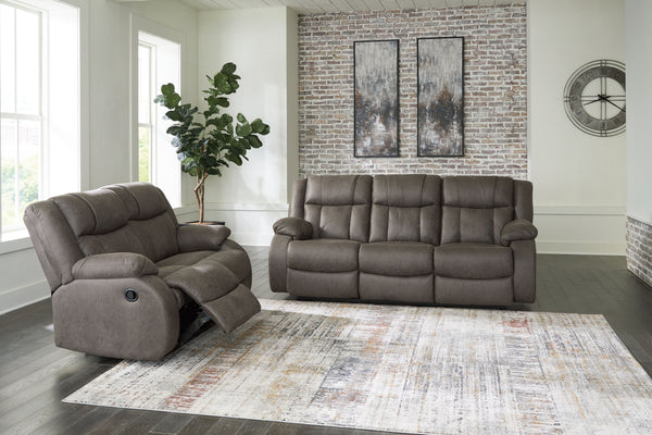 This sofa and loveseat set tees you up to catch up on streaming or enjoy the latest game without breaking the bank. Its easy reclining motion and inviting stitched details craft a stylish seat that keeps you utterly at ease. And with a versatile neutral f