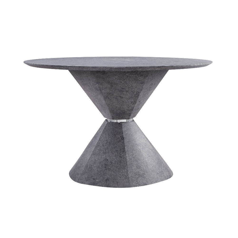 The Ansonia dining set features a pedestal dining table with a fixed round top and a trendy faux concrete finish. The matching side chairs are perched on sled metal bases with shiny chrome finish that contrasts beautifully with the gray PU upholstery on t