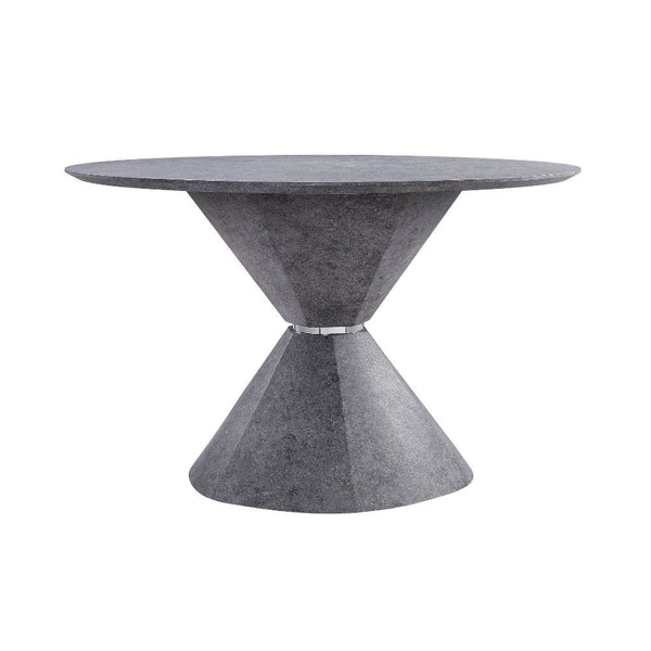 The Ansonia dining set features a pedestal dining table with a fixed round top and a trendy faux concrete finish. The matching side chairs are perched on sled metal bases with shiny chrome finish that contrasts beautifully with the gray PU upholstery on t