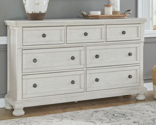  timeless furnishings take your bedroom to the next level. Nothing does that better than this dresser. The antiqued white finish with a wonderful grain texture radiates sophistication