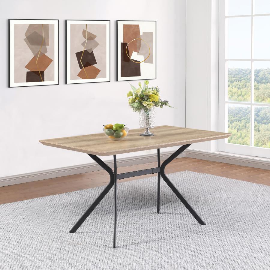 Freshen up your kitchen or dining room with a modern casual dining table. Its rectangular silhouette is versatile and stylish, perfect for multi-functional spaces like breakfast nooks and compact dining rooms. It boasts a medium brown wood grain tabletop 