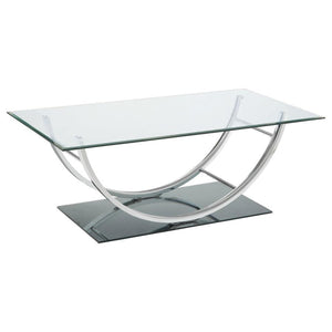 This contemporary rectangular coffee table features a clear tempered glass top and a sleek tempered mirrored base for a polished and modern appeal. The elegantly curved frame, crafted from electroplated heavy gauge metal in a chrome finish, enhances its s