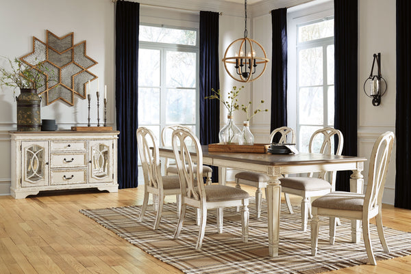 Traditional cottage design. Antiqued two-tone finish featuring chipped white with distressed wood finished tops. Tops feature Oak veneers, while the cases are made with birch veneers and hardwood solids. Framed drawer fronts and decorative fret laid over 