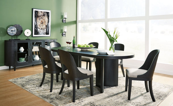 Contemporary lifestyle design. Made of hardwood solids and ash veneer. Rich layered black finish on textured wood grain surface. Collection is inspired by Art Deco designs with trend-right curved silhouettes. Table features an oval design and architectura