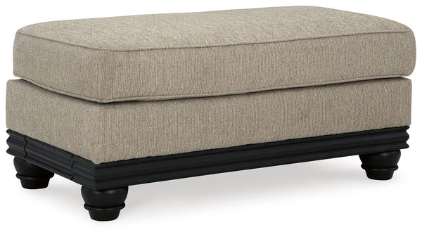 This ottoman suits those searching for a fresh take on versatile style, seamlessly transitioning from casual to modern with your decor. Its flexible character comes courtesy of a chunky fabric. Matte black wood trim creates innovative contrast. A virtuoso