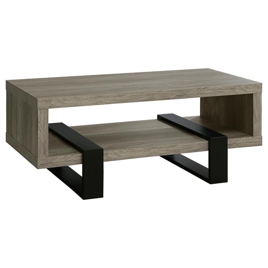 Experience a modern aesthetic with this rectangular coffee table that combines style and functionality. The grey driftwood finish highlights realistic wood grain, creating a rustic yet contemporary look. Crafted from durable engineered wood with a scratch