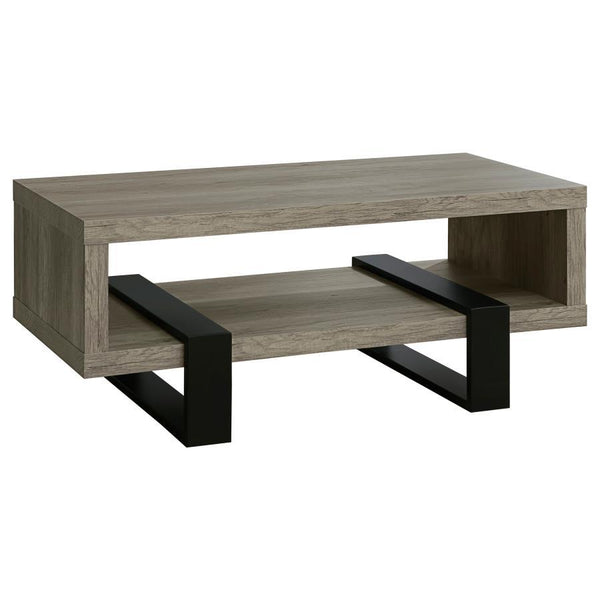 Experience a modern aesthetic with this rectangular coffee table that combines style and functionality. The grey driftwood finish highlights realistic wood grain, creating a rustic yet contemporary look. Crafted from durable engineered wood with a scratch
