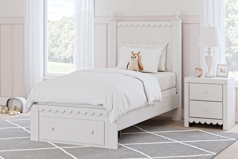 Make morning or bedtime that much more magical with this twin panel storage bed. Charmingly cute with its scalloped detailing, it appeals to both her sense of playful whimsy and your love for modern design. Drawers in the footboard provide handy storage f