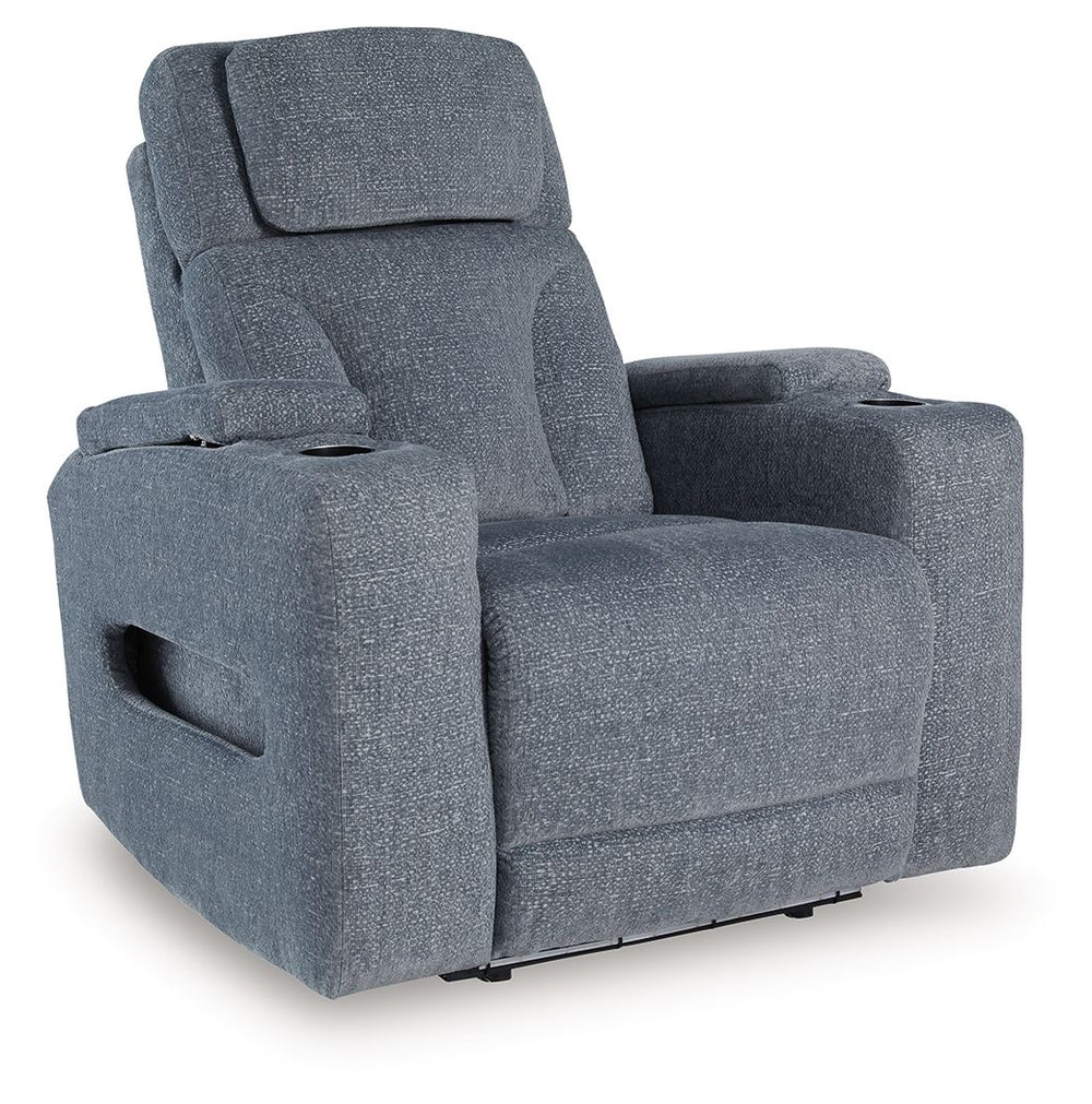Chill-out time has never looked better. This power recliner-'s adjustable headrest ensures a perfect view of the TV no matter how far back you recline, while the extended ottoman takes your comfort to the next level. Handy charging features and storage cu