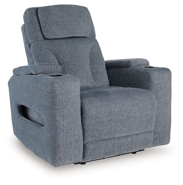 Chill-out time has never looked better. This power recliner-'s adjustable headrest ensures a perfect view of the TV no matter how far back you recline, while the extended ottoman takes your comfort to the next level. Handy charging features and storage cu