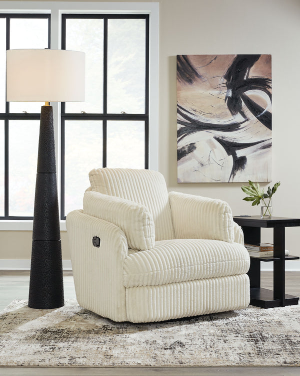  this recliner envelops you in comfort with its barrel shape and soft cord upholstery. It reclines