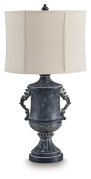 Those who delight in the beauty of a bygone era are sure to be charmed by this richly traditional table lamp. Its base is detailed with ornate patterns and embellished with gracefully curved handles. An antiqued black finish lends a look thatâ€™s aged to 