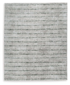 If thereâ€™s any rug that beckons you to slip off your shoes and sink your toes into true comfort, this area rug is it. Just imagine how good the plush woven shag will feel underfoot. And its dreamy, creamy color with sage stripes? The ultimate choice for