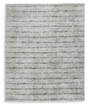 If thereâ€™s any rug that beckons you to slip off your shoes and sink your toes into true comfort, this area rug is it. Just imagine how good the plush woven shag will feel underfoot. And its dreamy, creamy color with sage stripes? The ultimate choice for